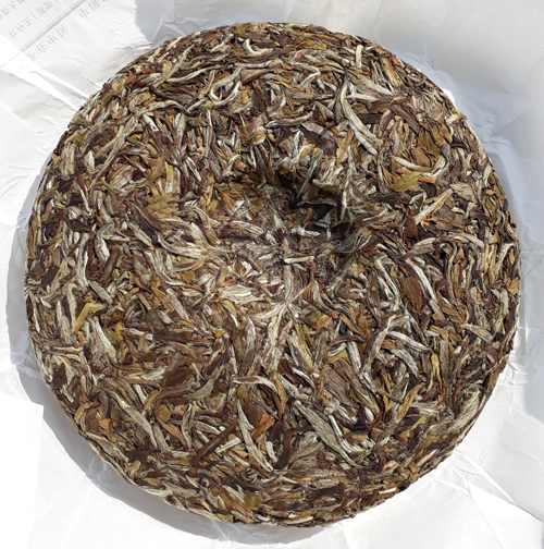 White Peony King Tea cake unwrapped