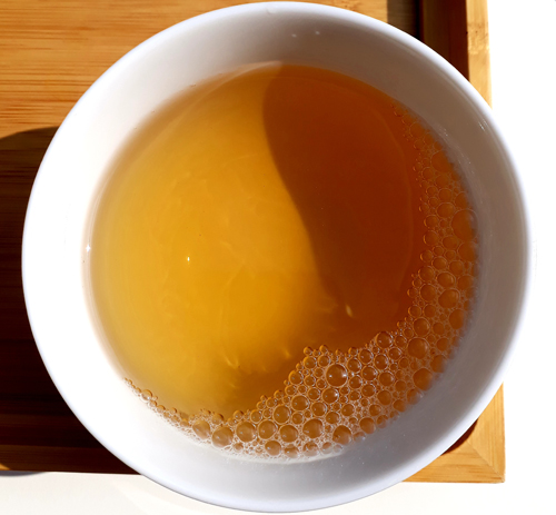 White Peony King Tea cake tea liquor