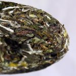 Tea For You Bai Mudan White tea cake side on close up